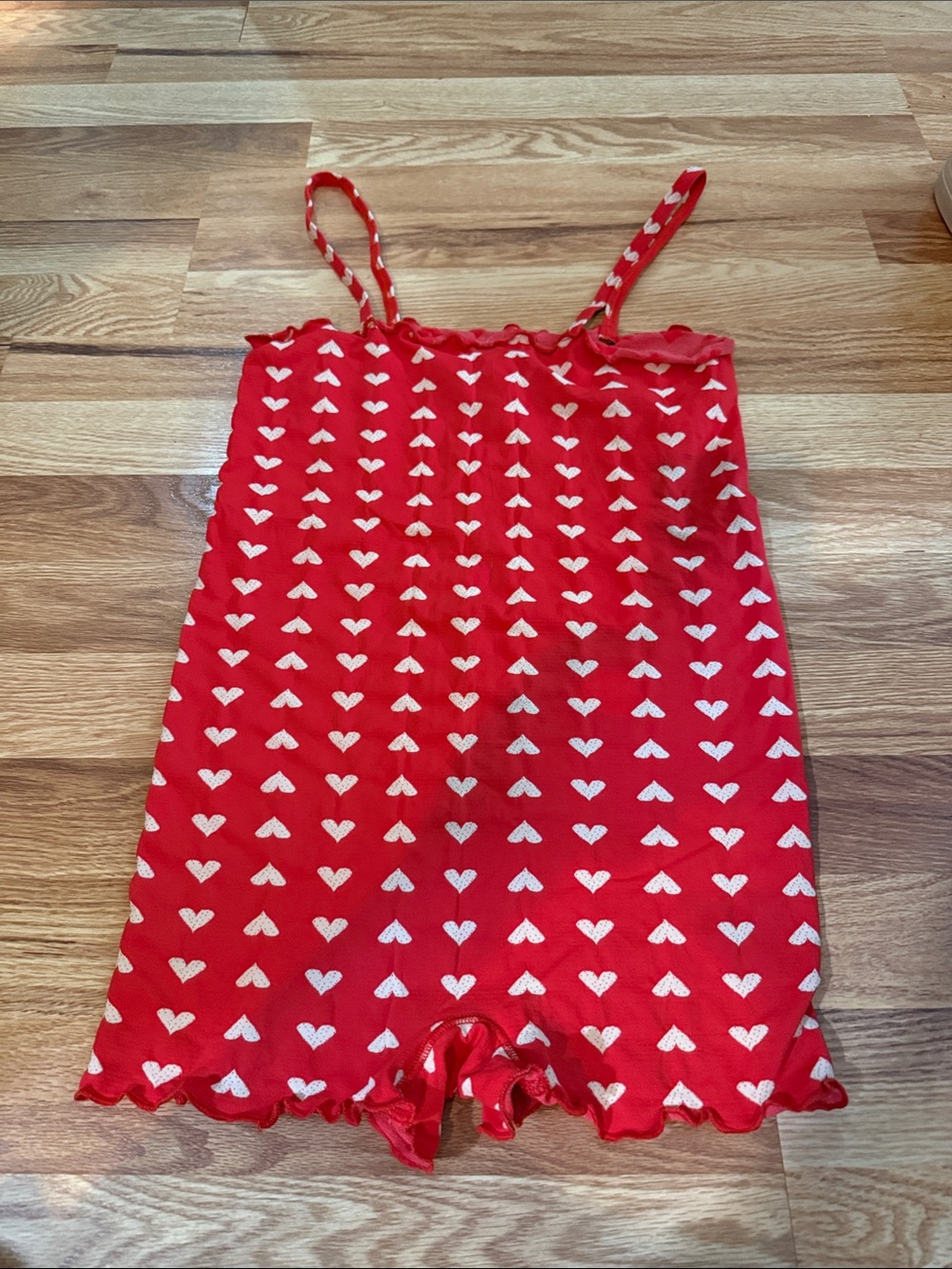 Free People Women’s red and white heart romper.